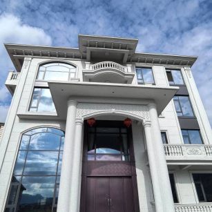 白山白麻别墅外墙干挂石材效果示例