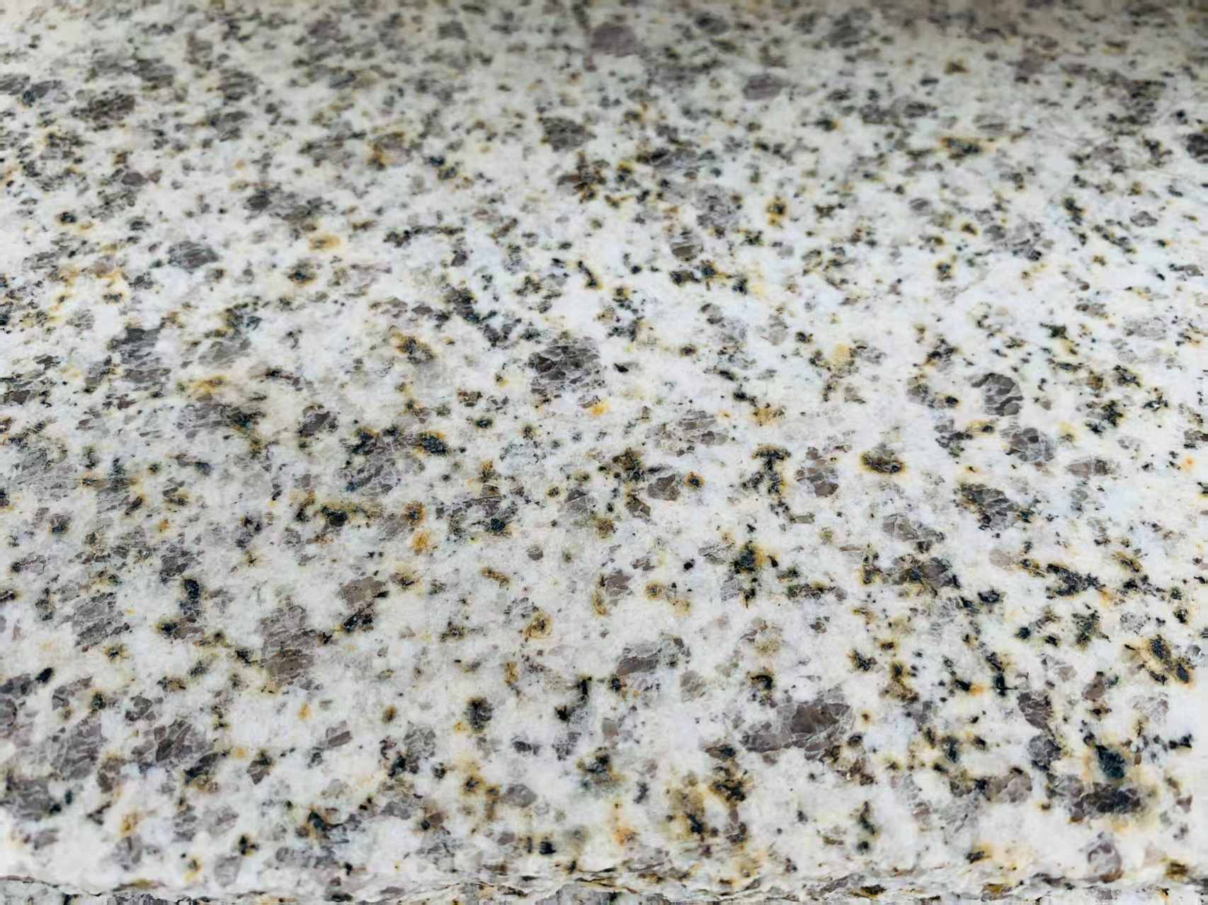 白山 黄金麻花岗岩石材浅黄光面