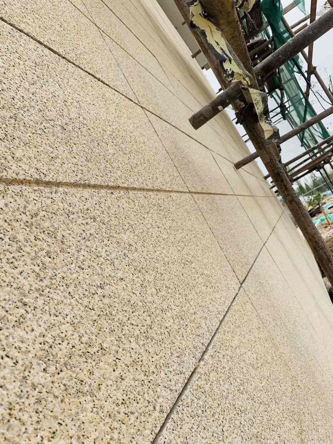 白山 黄金麻花岗岩荔枝面外墙干挂石材效果示例